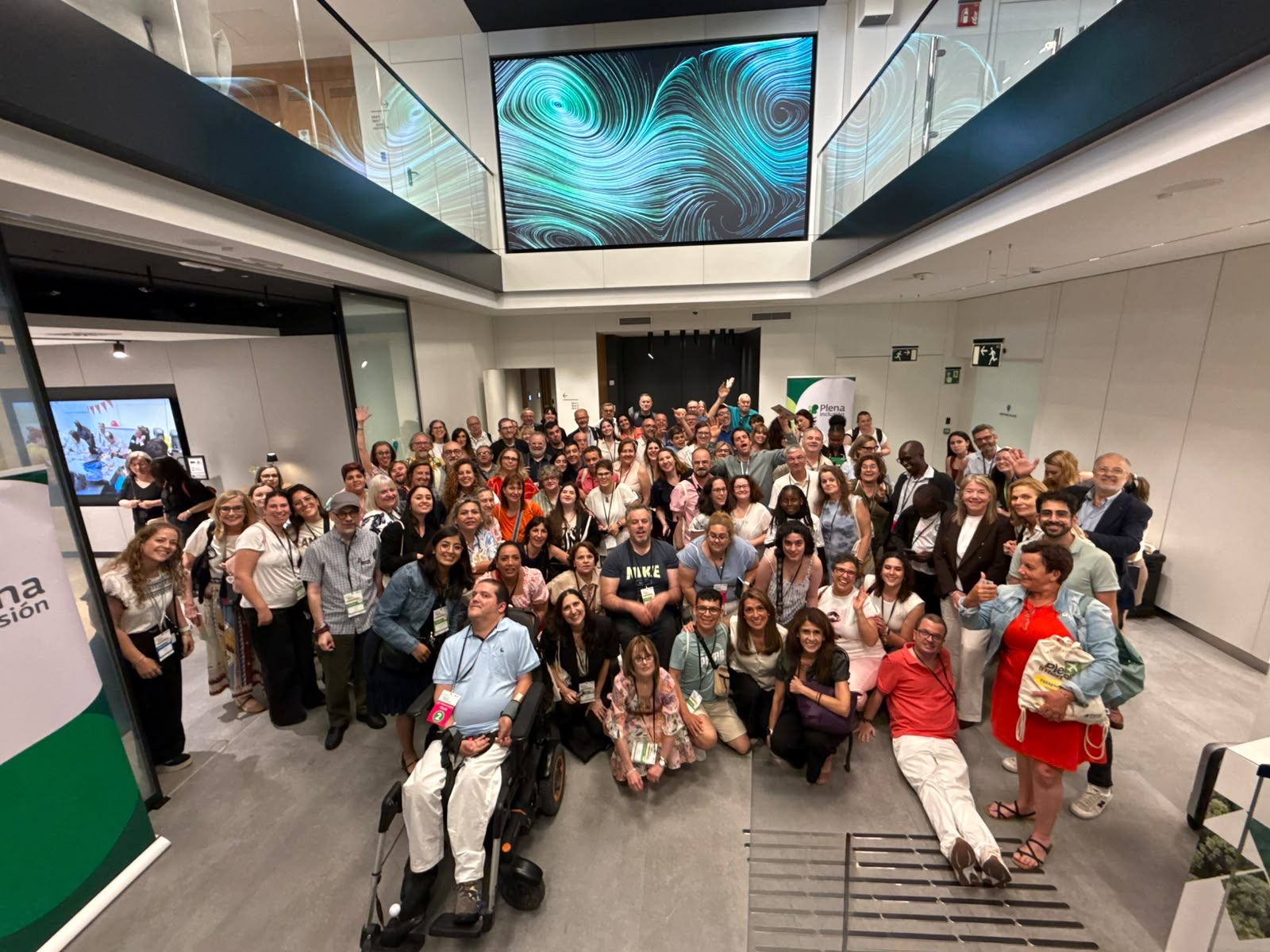 Foto grupal del Encuentro Plena Internacional 2026 en GMP Meeting Place, Madrid